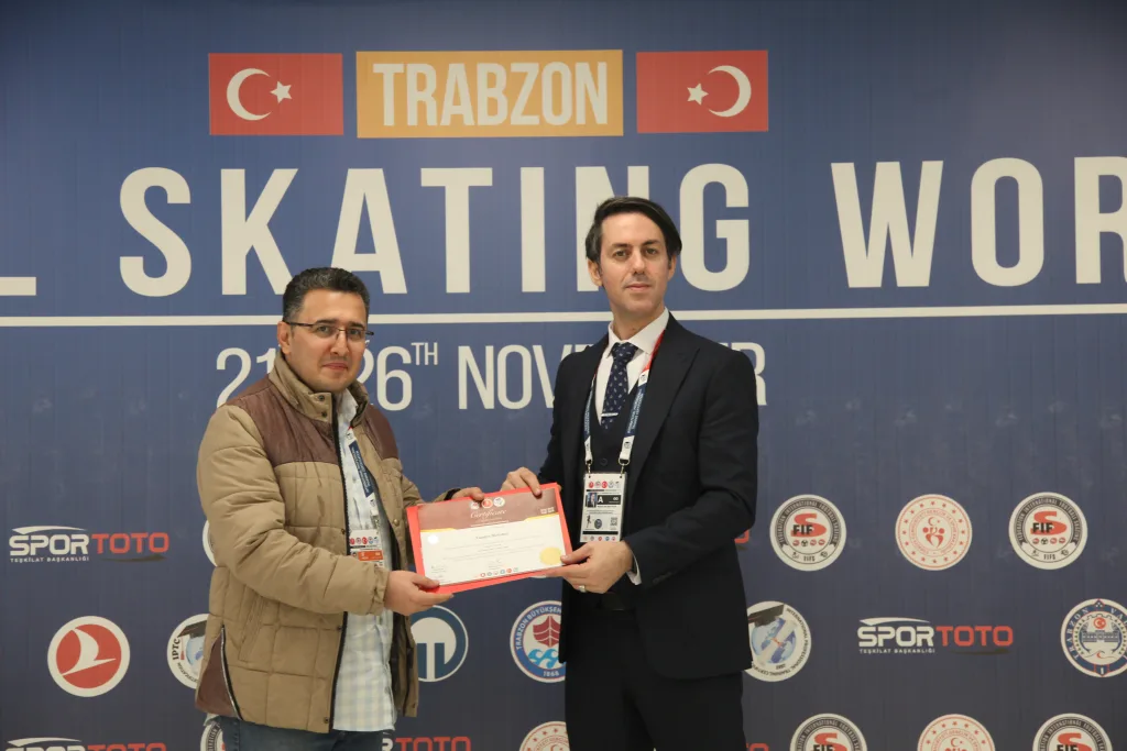 An official certificate presented against the Football Skating World Cup 2024 sponsor backdrop