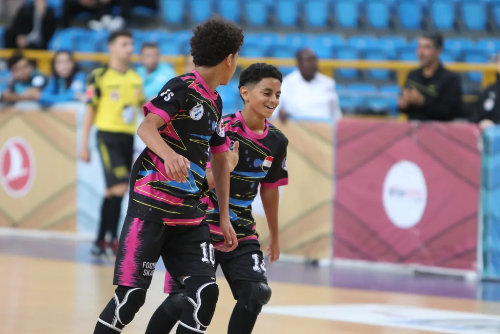 Girls and boys competing together in the same junior Football Skating team