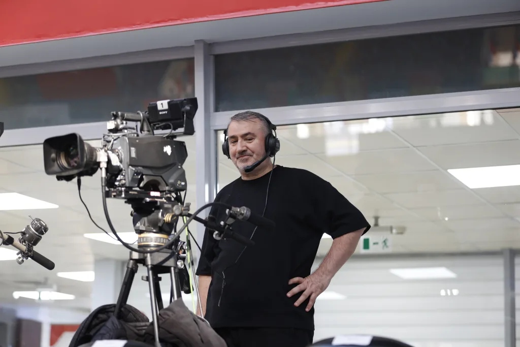 Broadcast crew operating a camera at the Football Skating World Cup