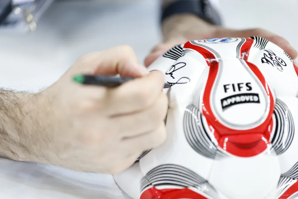 Close-up of the official size 5.5 Football Skating ball marked FIFS APPROVED