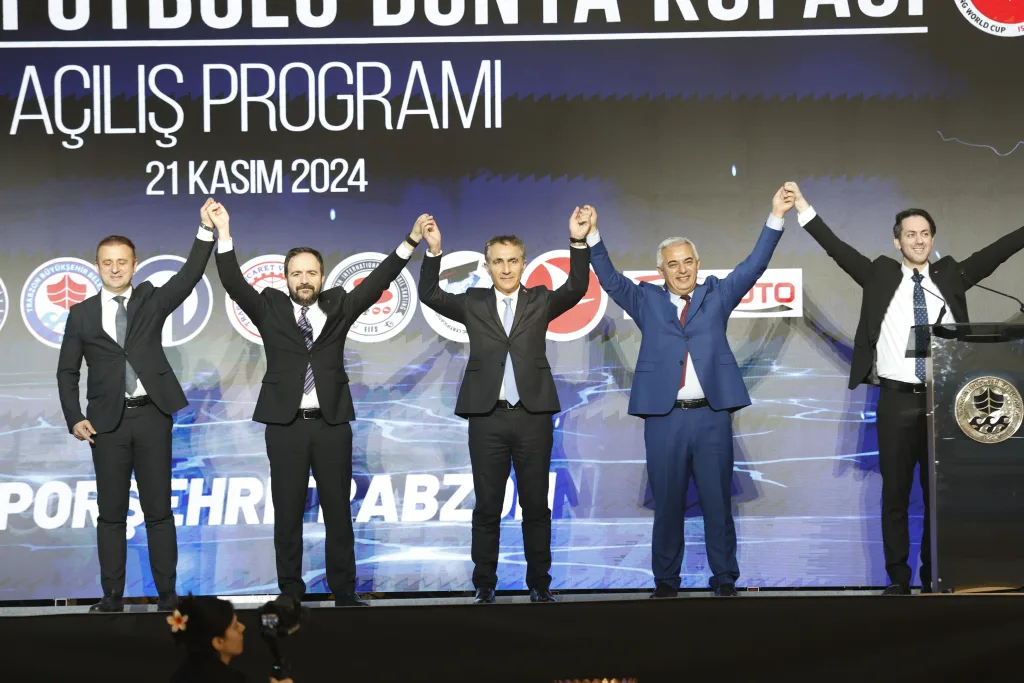 Federation officials in conversation at an international event