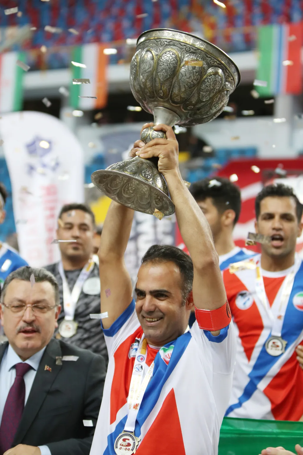 Champions lifting the Football Skating World Cup trophy at the 2024 closing ceremony