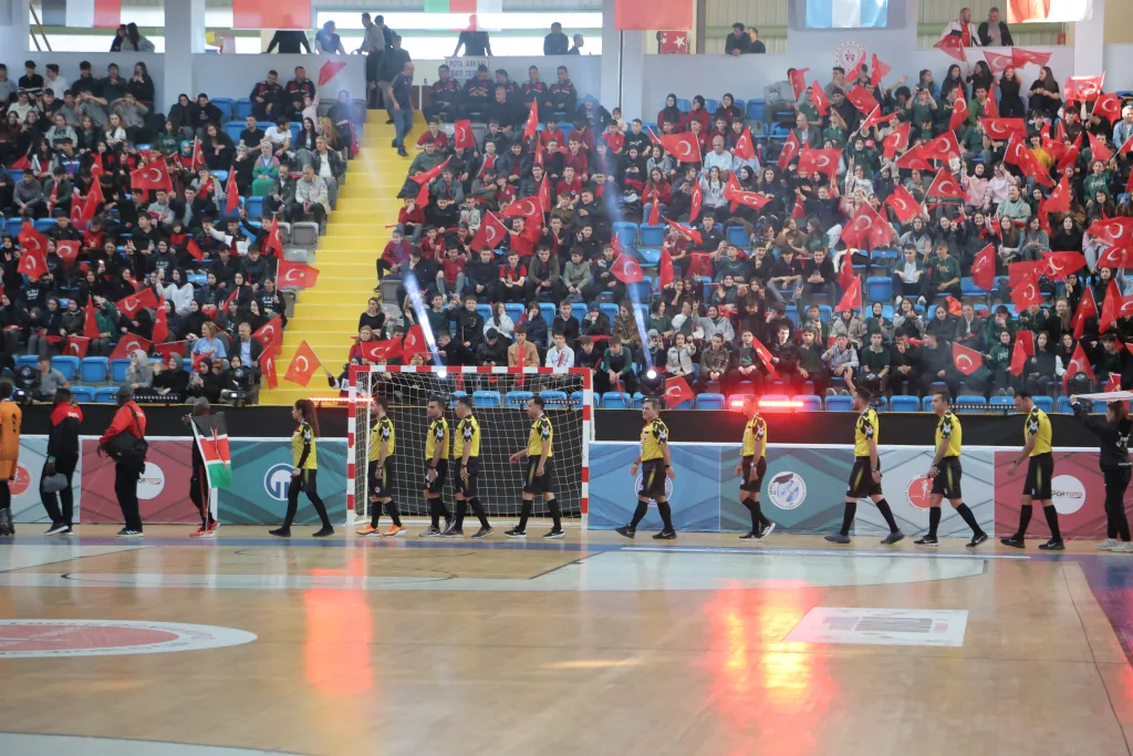 A full arena of supporters and national teams at the Football Skating World Cup