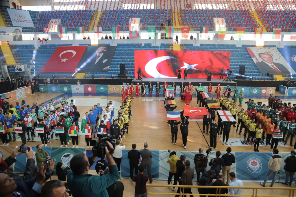 The parade of nations crossing the court at the Football Skating World Cup