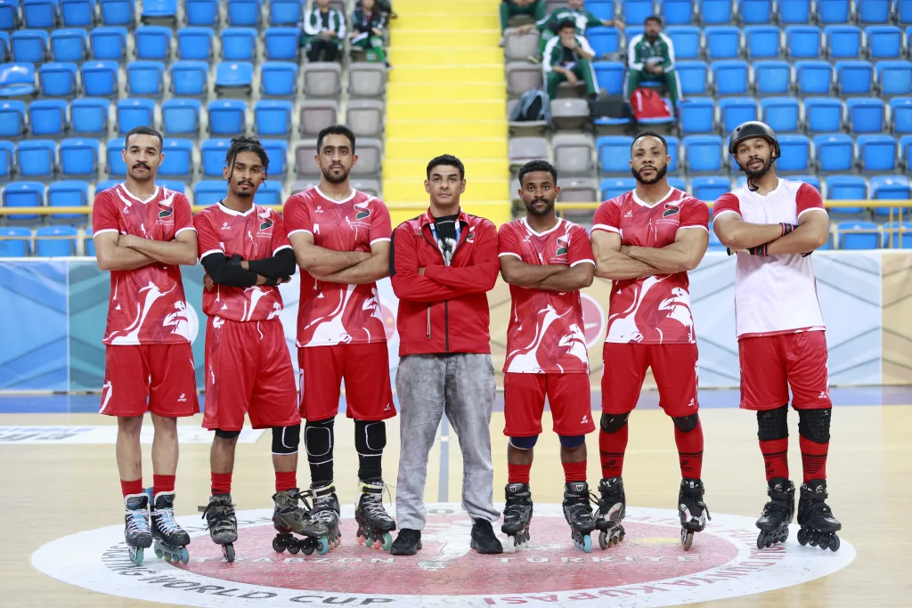 A club team lined up together on court before an official match