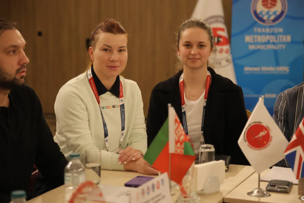 Women representatives of national federations at an official FIFS meeting with their national flags