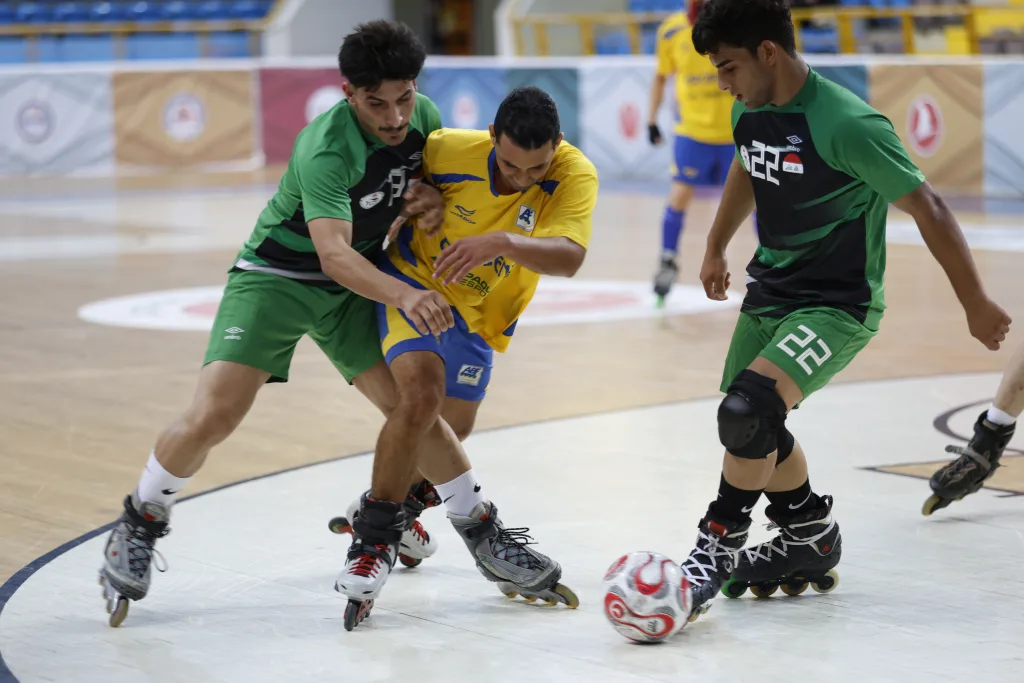 Two national teams contesting the ball on inline skates during World Cup competition